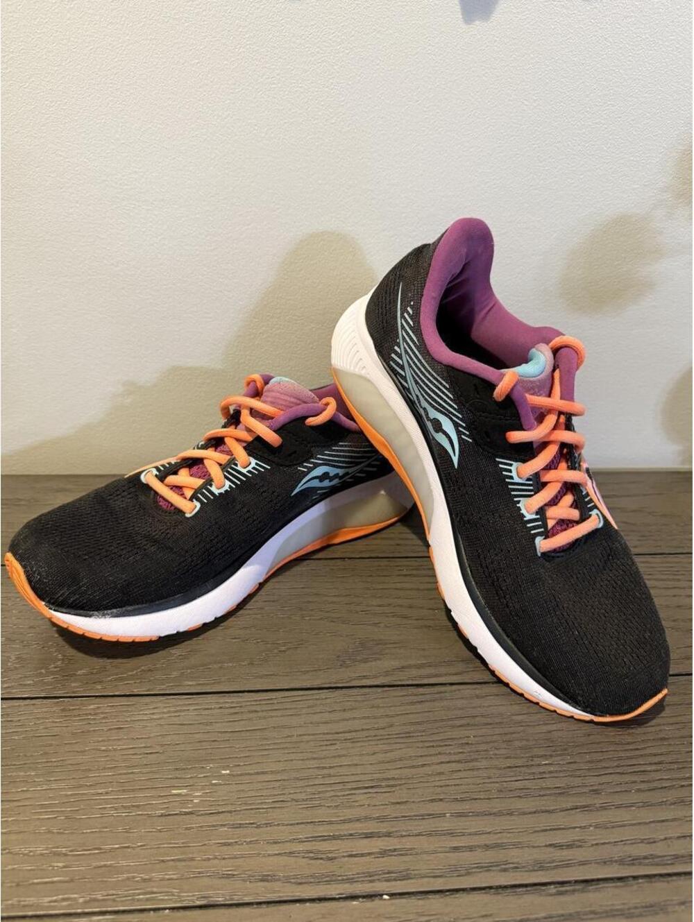 Saucony Women's Ride 16 Black Running Shoes with Orange & Purple Accents